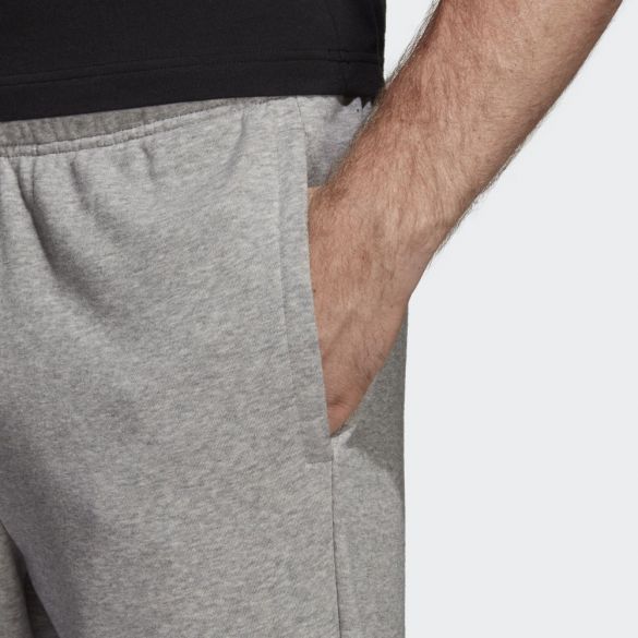 Брюки Must Haves Badge of Sport DT9959_image_4