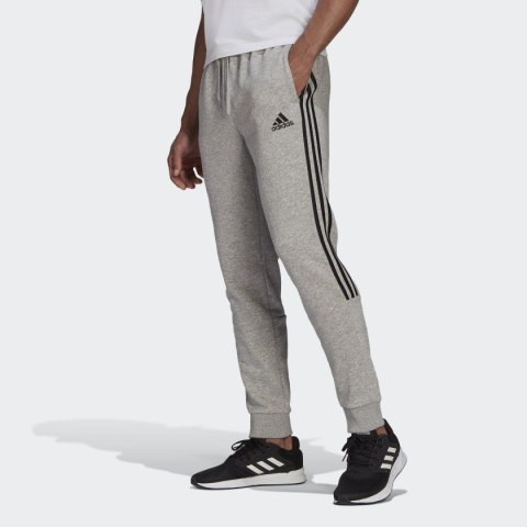 Чоловічі штани Adidas Essentials Fleece Tapered Cuff 3-Stripes GK8976_image_1