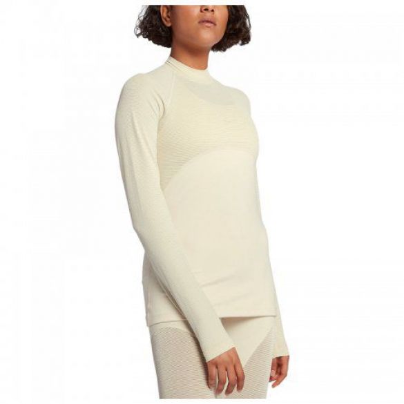 Жіноча футболка Nike W Np Wm Top Ls Chmpgne AO9226-258_image_1